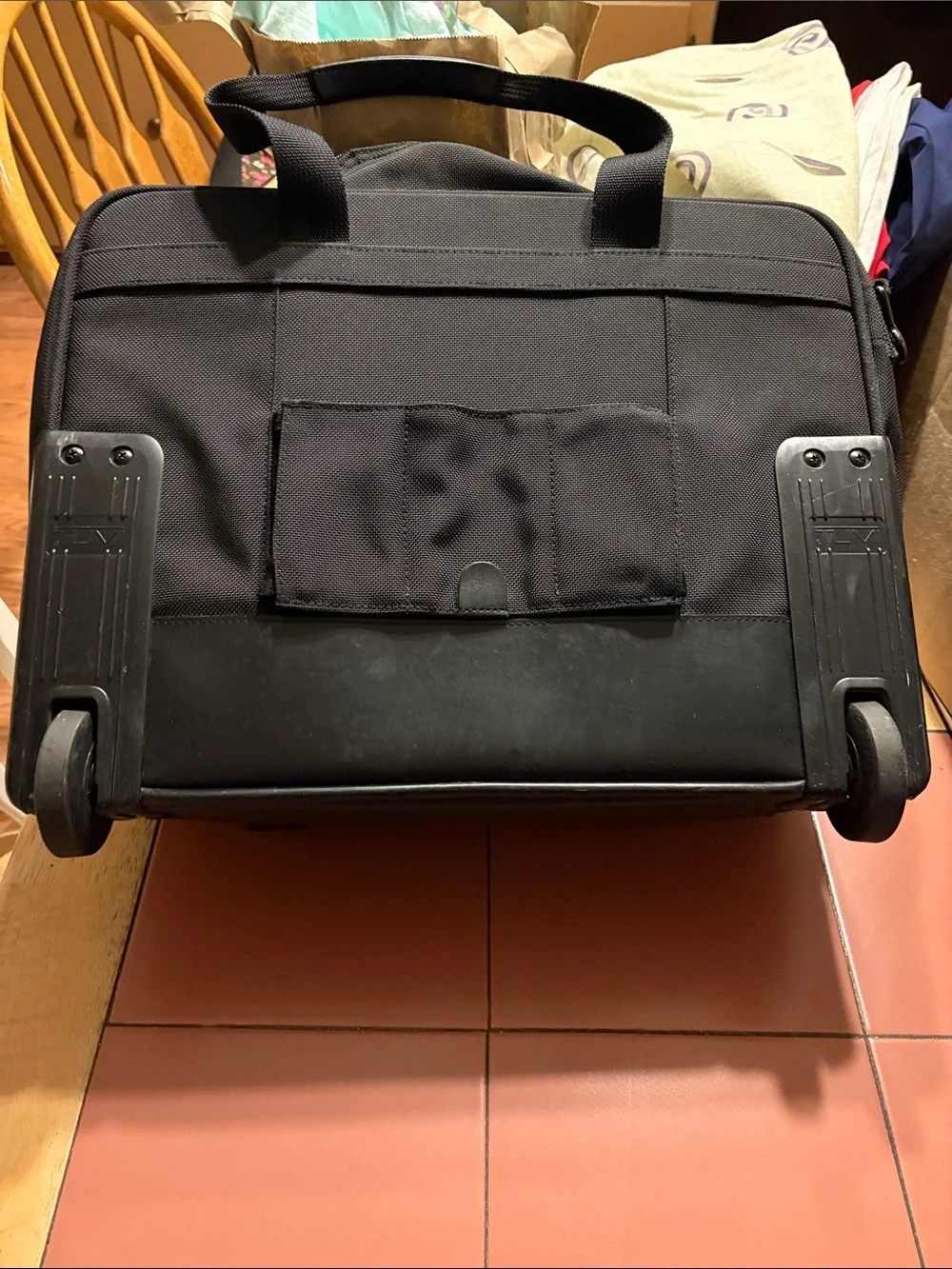 Tumi Black Rolling Travel Garment Bag with Multiple Front Pockets